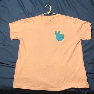 Light pink pacsun peace shirt.